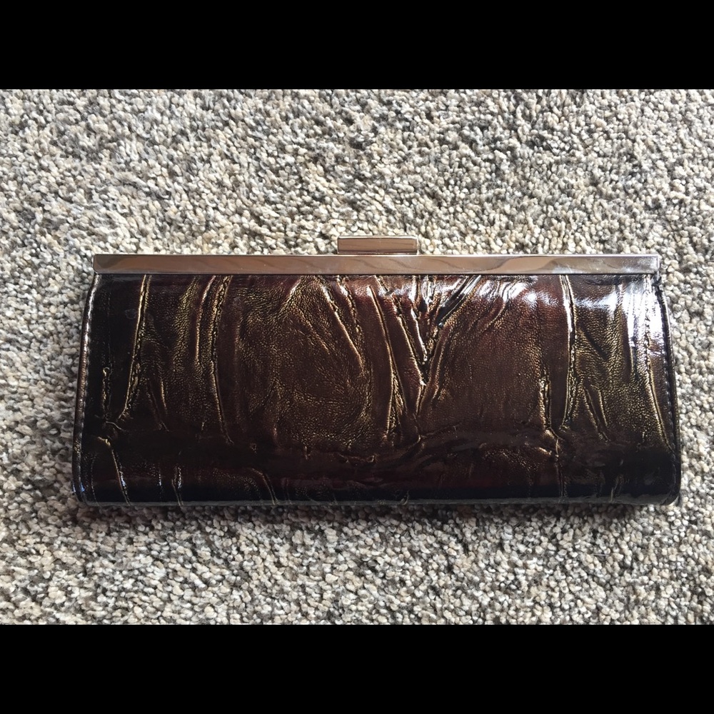 Metallic green clutch